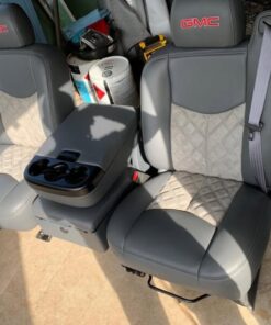 99-06 gray leather GMC seats with quilted light gray suede inserts and red embroidered GMC logos.